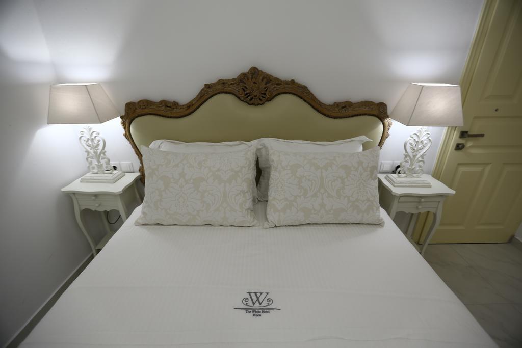 آداماس The White Suites الغرفة الصورة
