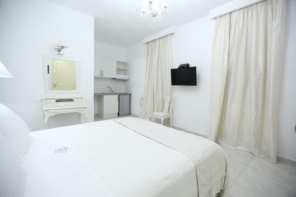 آداماس The White Suites الغرفة الصورة
